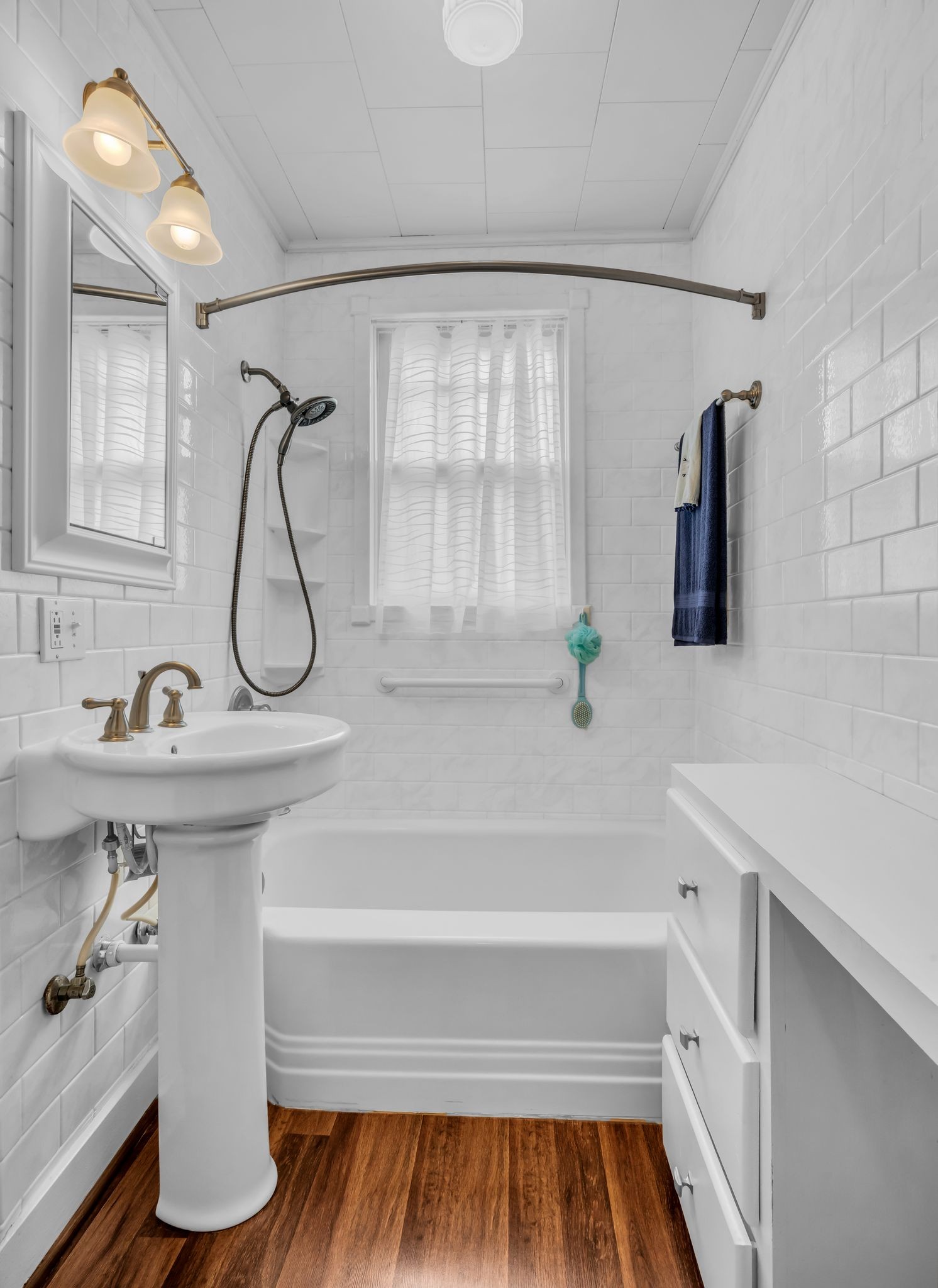 104 West Chestnut Street Dickson, TN 37055 - Photo 20 of 27 a bathroom with a sink and a mirror