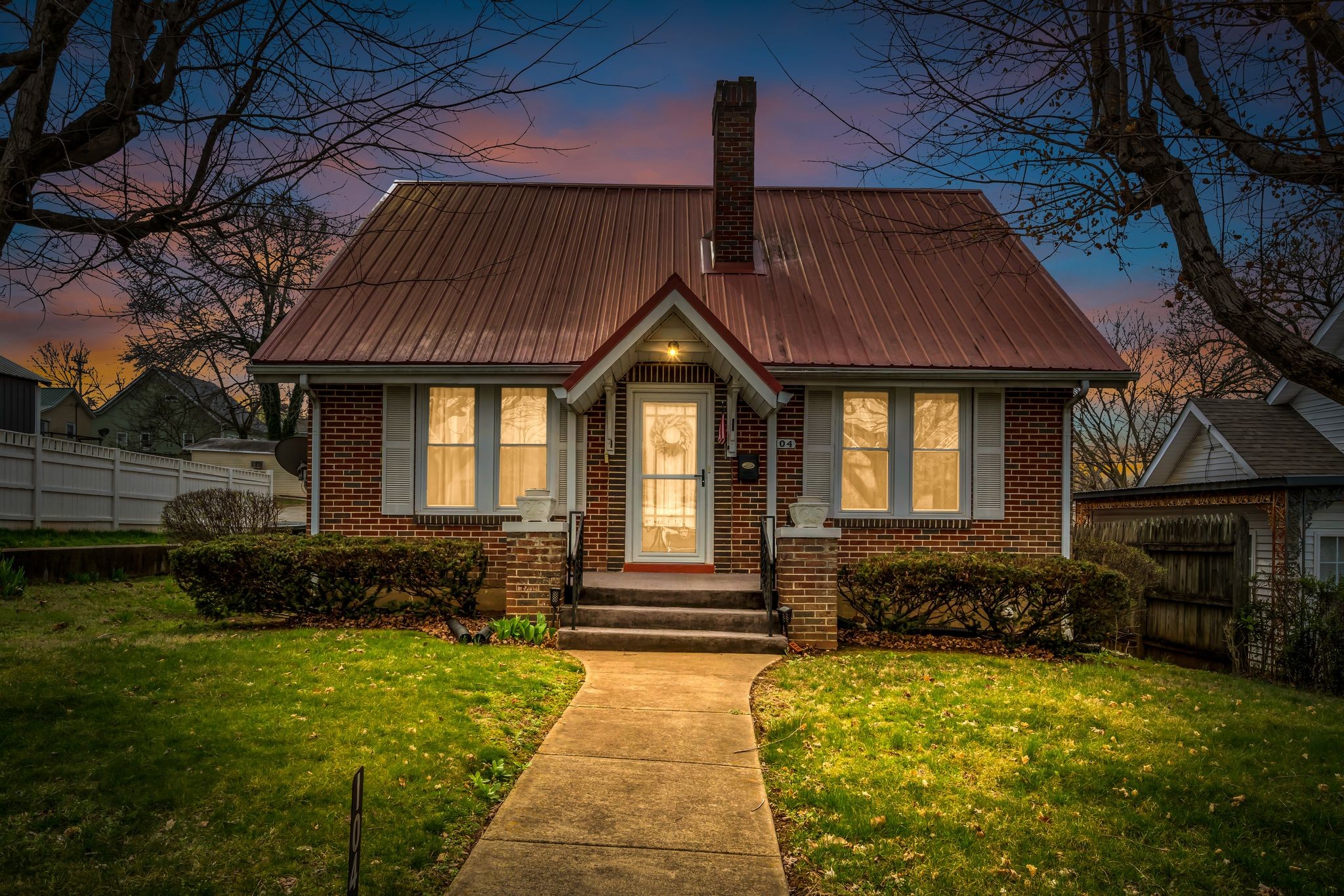 104 West Chestnut Street Dickson, TN 37055 - Photo 27 of 27 a front view of a house with a yard