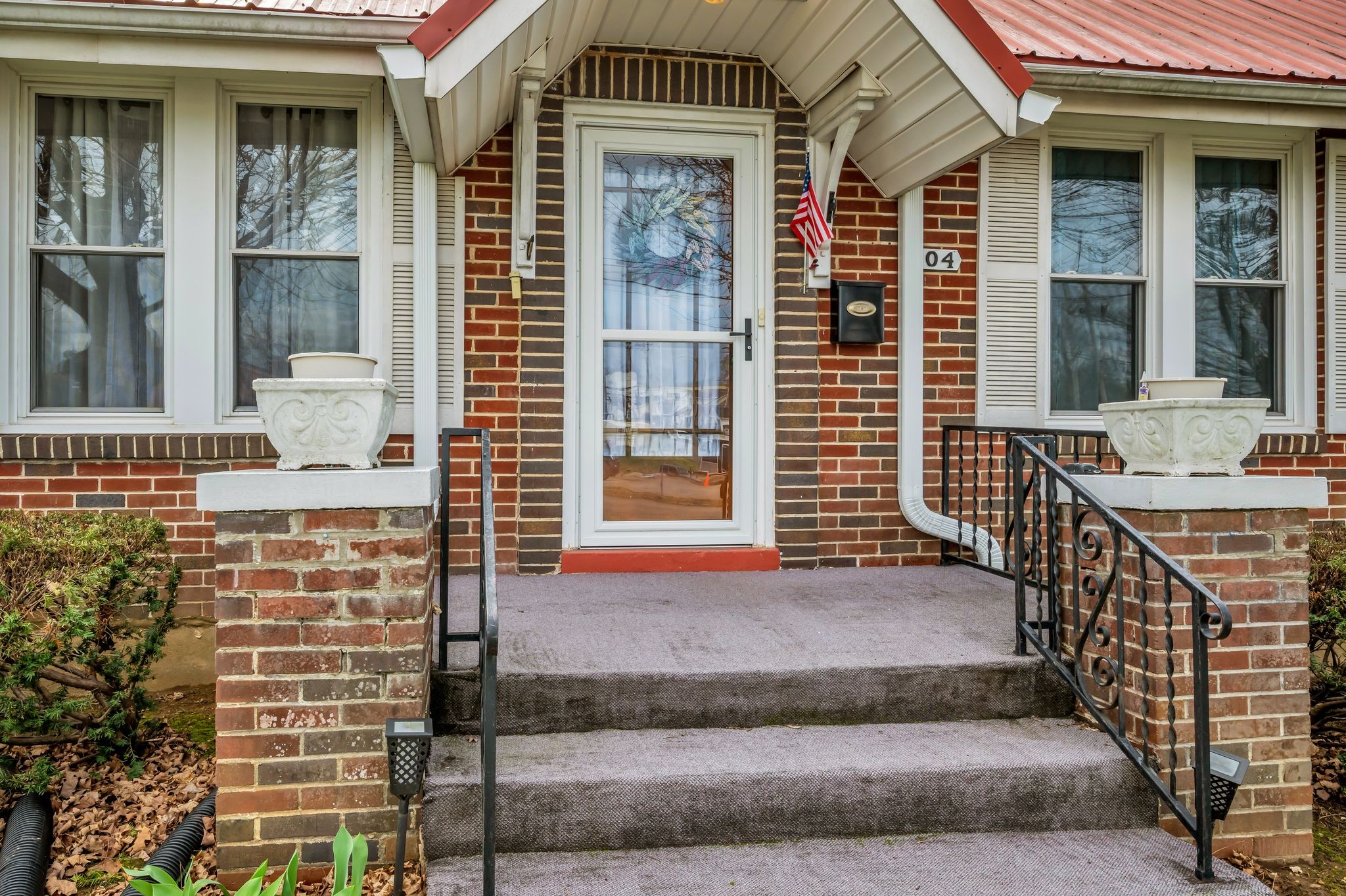 104 West Chestnut Street Dickson, TN 37055 - Photo 5 of 27 a view of a brick building with many windows