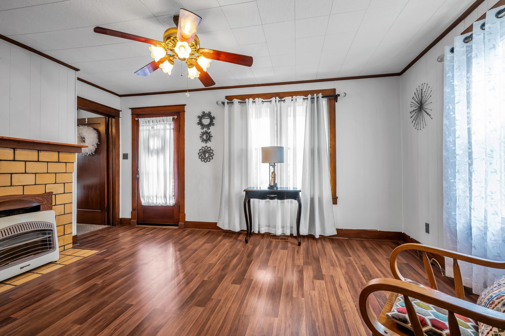 104 West Chestnut Street Dickson, TN 37055 - Photo 6 of 27 a view of an empty room with a window and wooden floor