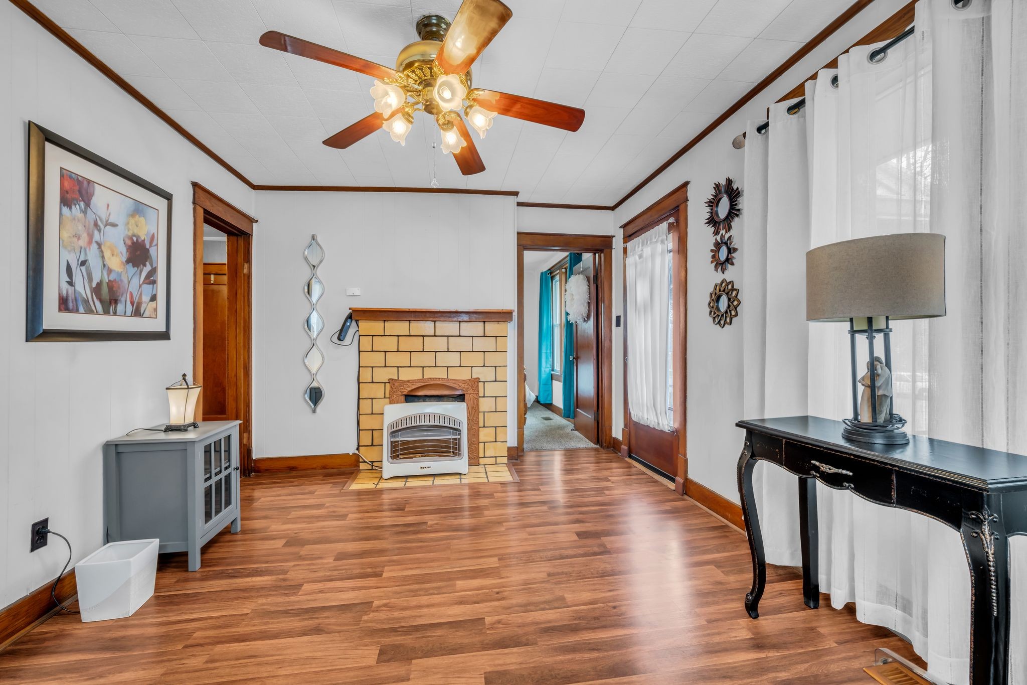 104 West Chestnut Street Dickson, TN 37055 - Photo 7 of 27 a view of a livingroom with furniture window wooden floor and a ceiling fan