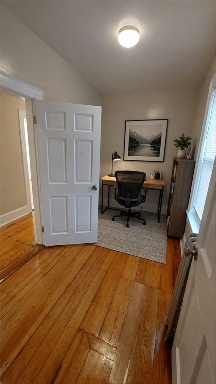 35 Catawba Street, Unit 2 Boston, MA 02119 - Photo 10 of 15 a bedroom with furniture and a window