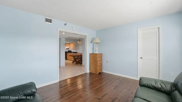 a view of livingroom with furniture and wooden floor