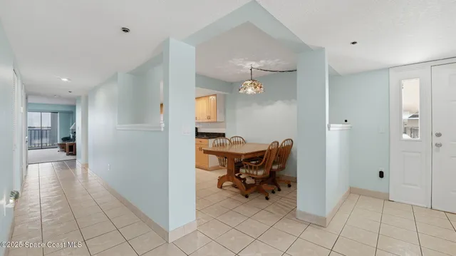 a view of a hallway with seating area