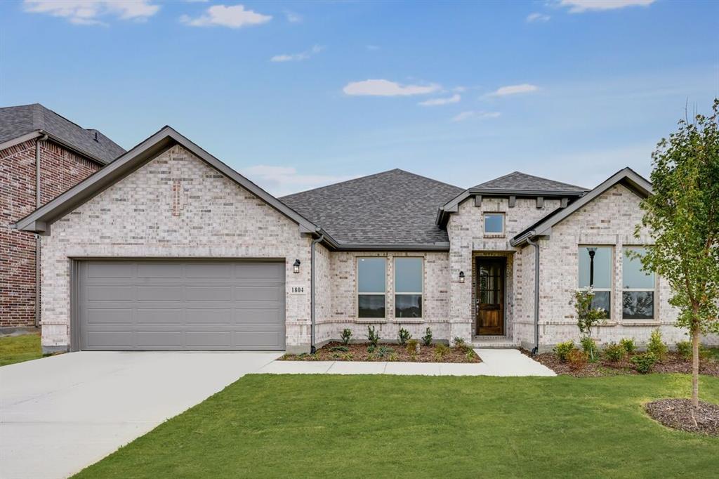 1804 Beech Ridge Drive Northlake, TX 76226 - Photo 1 of 1 a front view of house with yard barbeque and outdoor seating