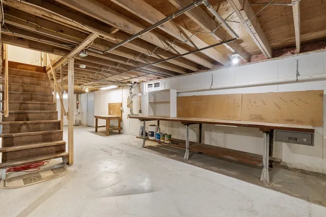 a view of balcony with wooden floor and fence