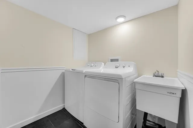 a utility room with dryer and washer