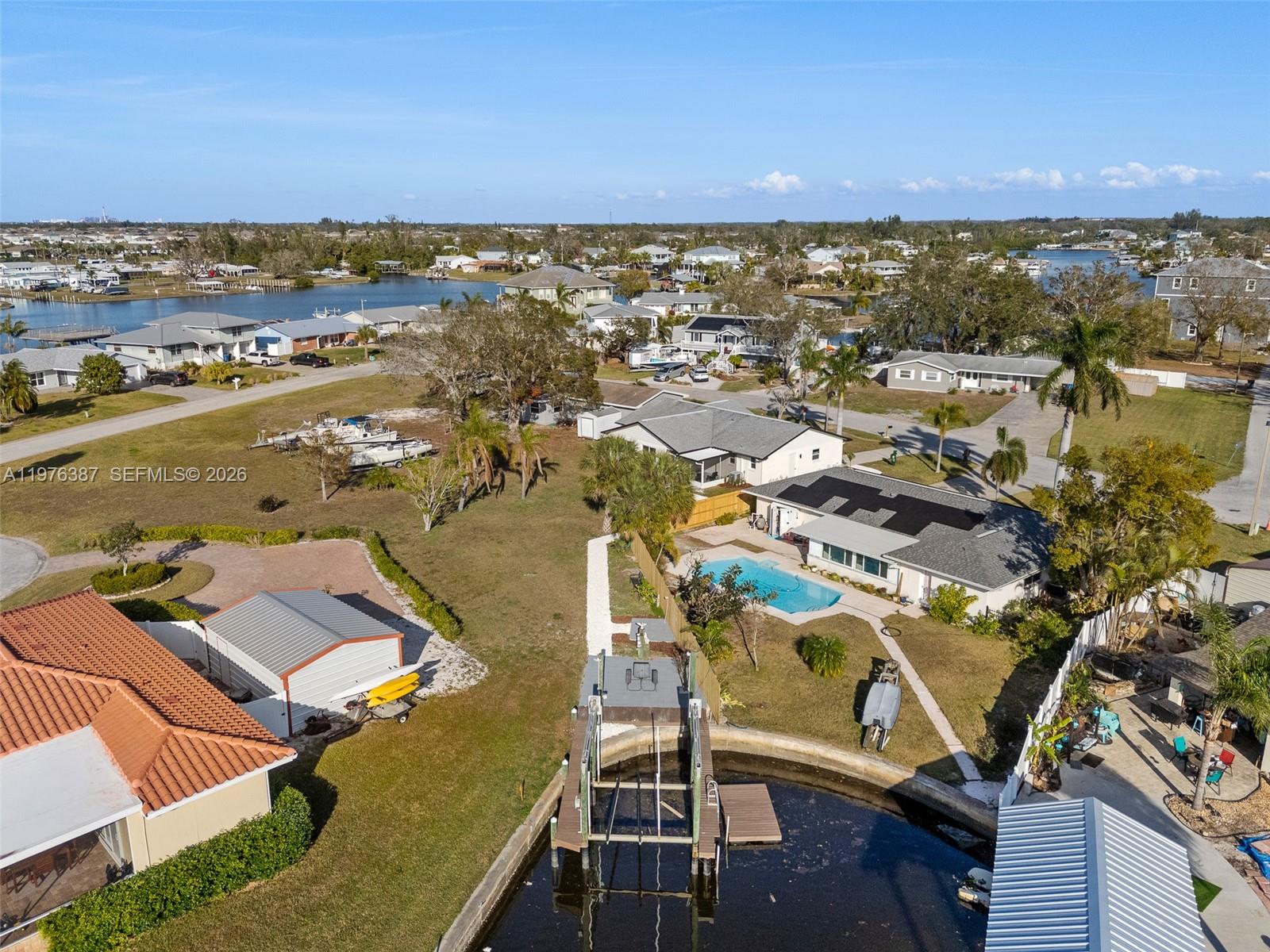 105 12th Street Southwest Ruskin, FL 33570 - Photo 74 of 89 an aerial view of residential houses with outdoor space