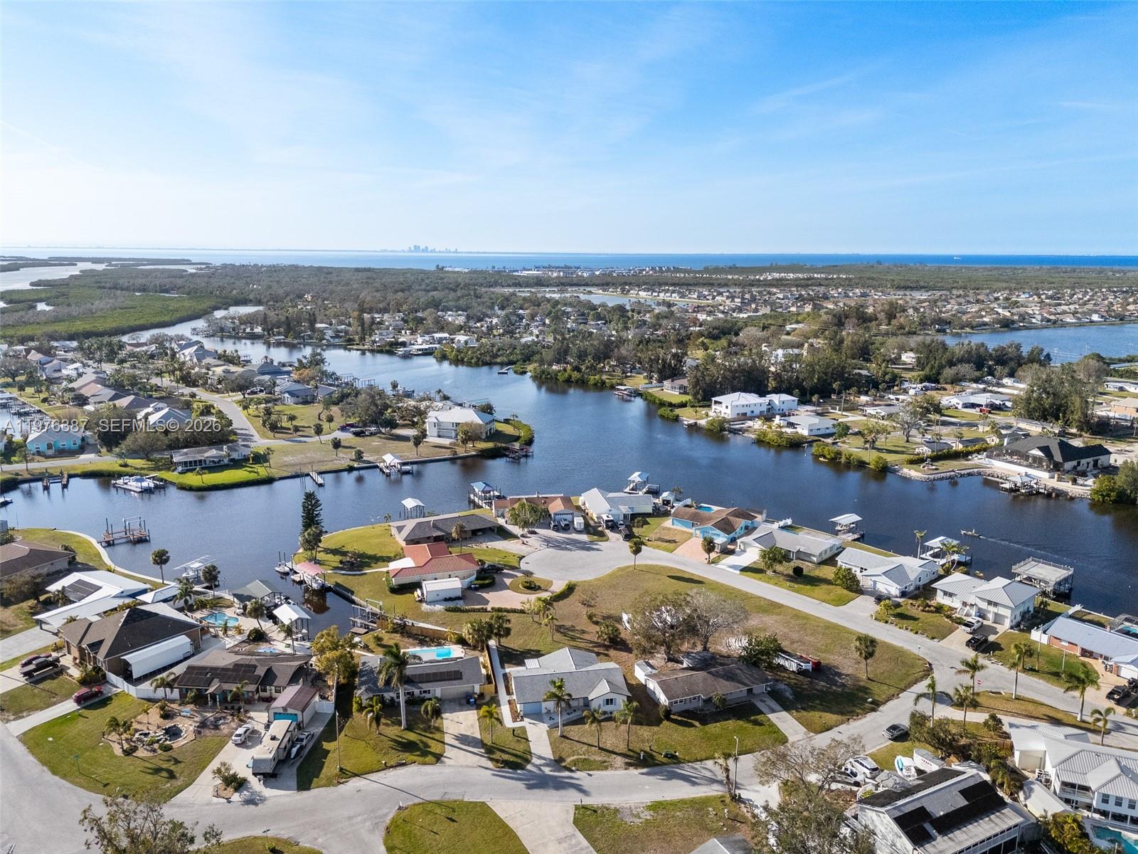 105 12th Street Southwest Ruskin, FL 33570 - Photo 78 of 89 an aerial view of a houses with outdoor space