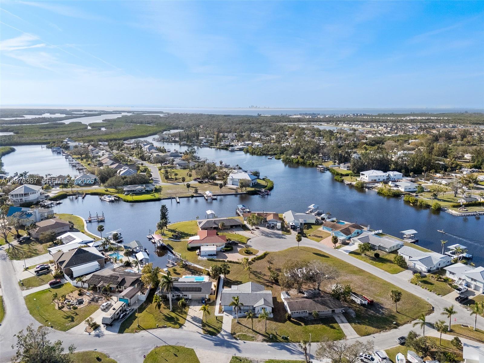 105 12th Street Southwest Ruskin, FL 33570 - Photo 79 of 89 an aerial view of a houses with outdoor space