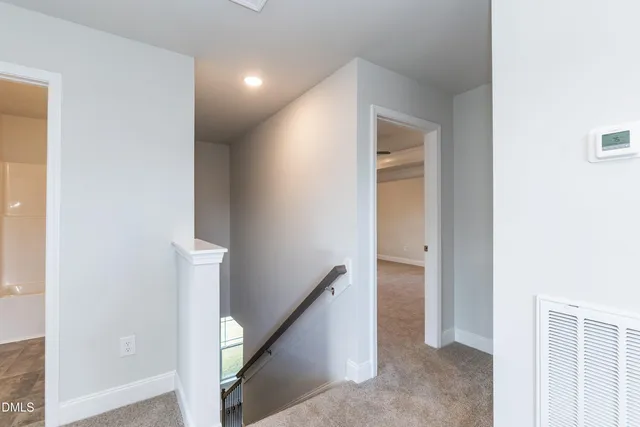 a view of a hallway with closet