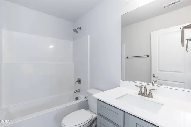 a bathroom with a sink toilet bathtub and shower