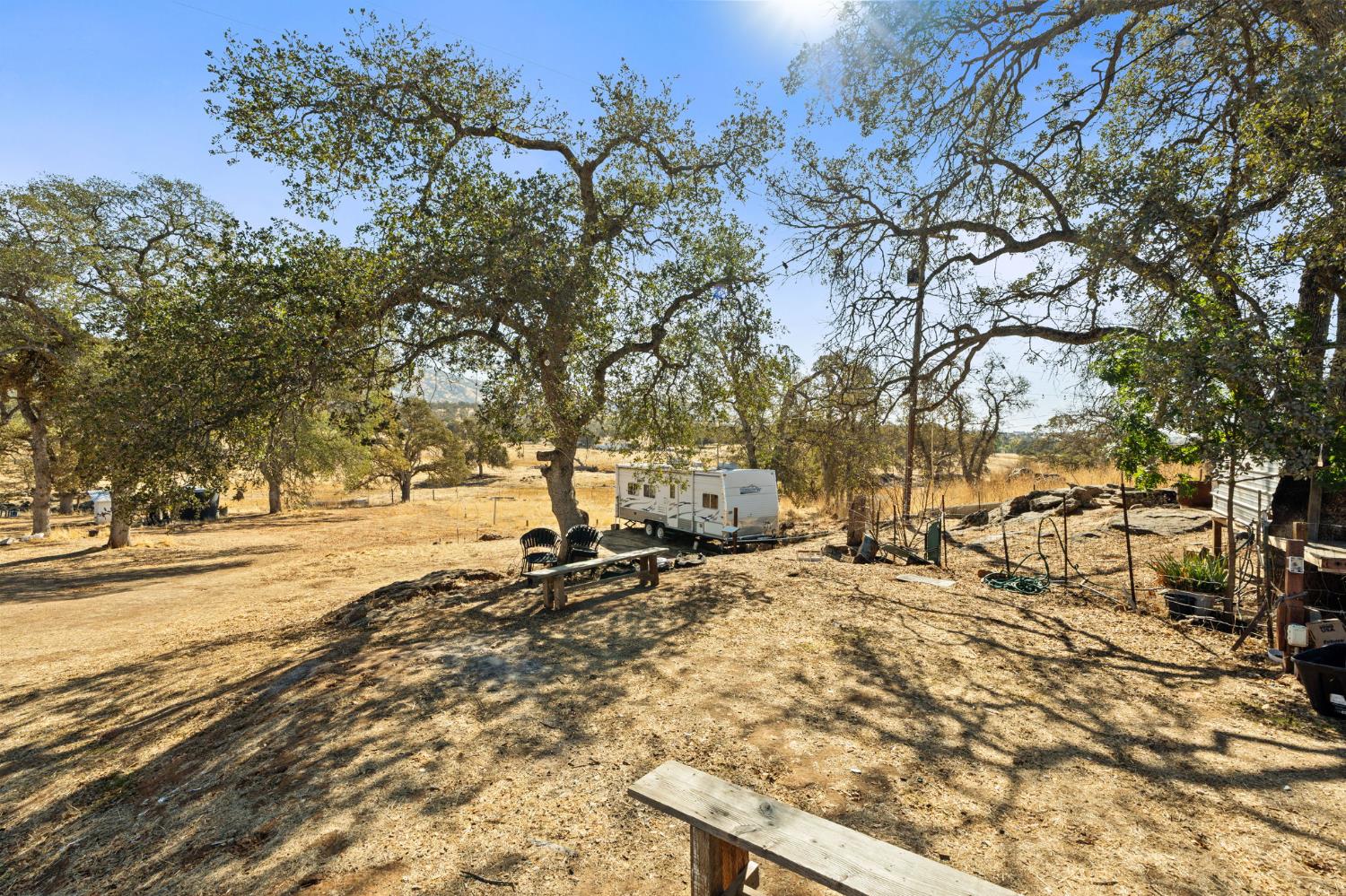 4963 Valley Lane Catheys Valley, CA 95306 - Photo 14 of 40 a view of a yard with some trees