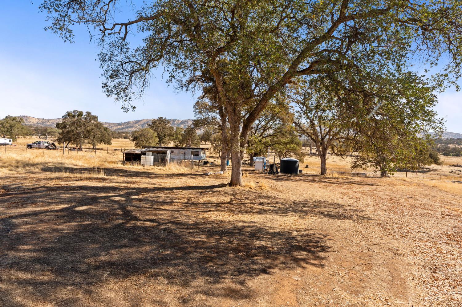 4963 Valley Lane Catheys Valley, CA 95306 - Photo 16 of 40 a view of a yard with a house