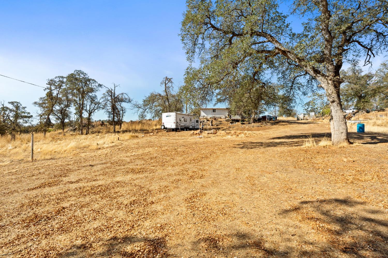 4963 Valley Lane Catheys Valley, CA 95306 - Photo 20 of 40 a view of road with large trees