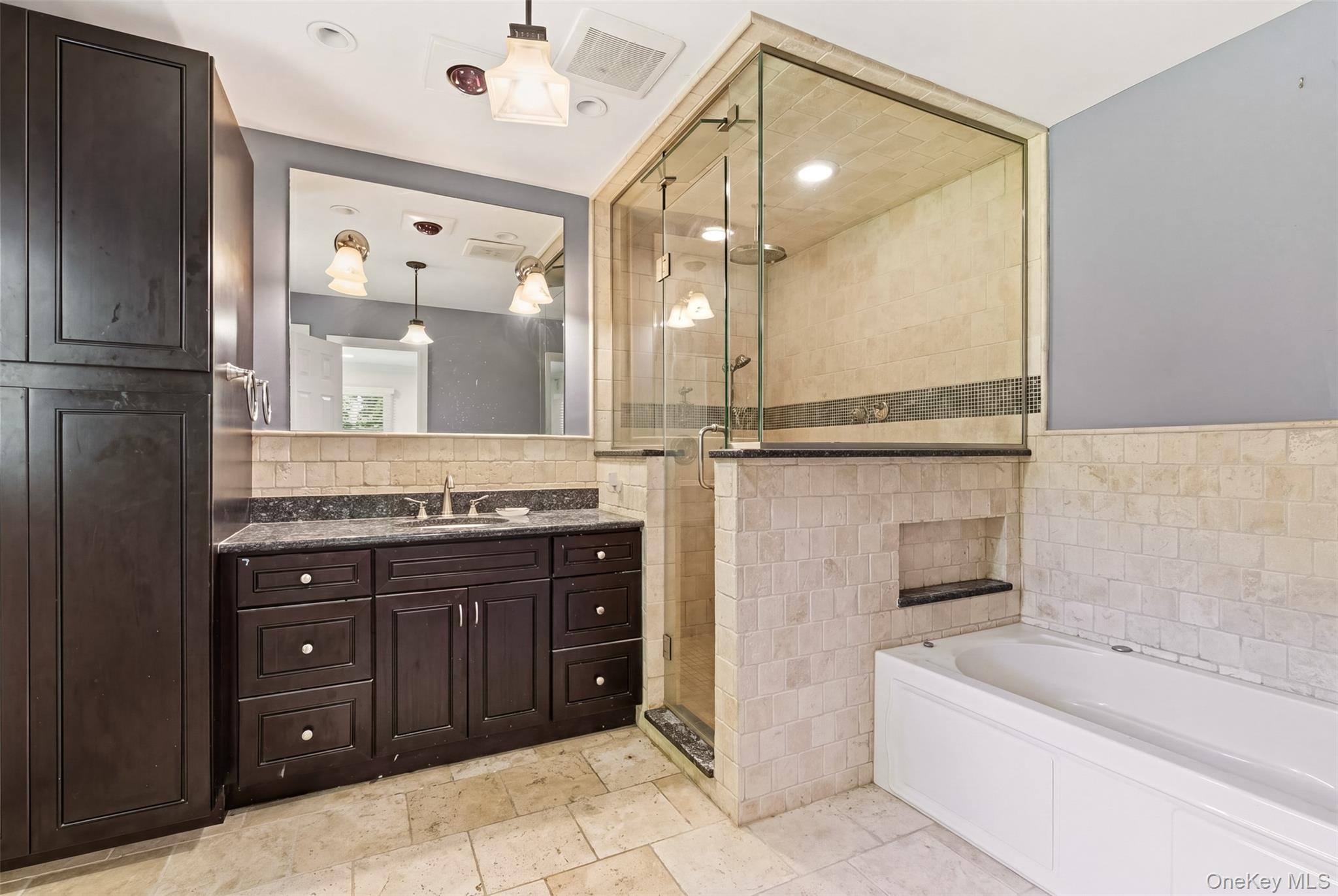 106 Vineyard Road Huntington, NY 11743 - Photo 11 of 25 a bathroom with a tub sink shower and mirror