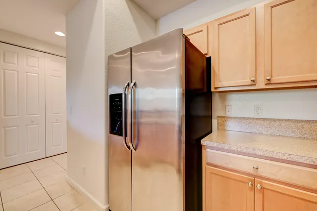 a bathroom with a shower and a cabinet