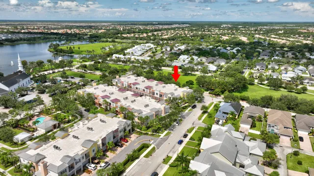 a view of multiple houses with yard