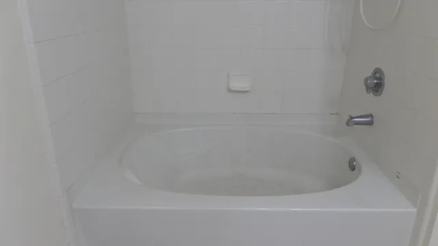 a close up of a bathtub