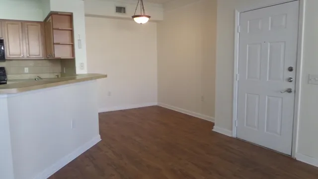 a view of kitchen with wooden floor