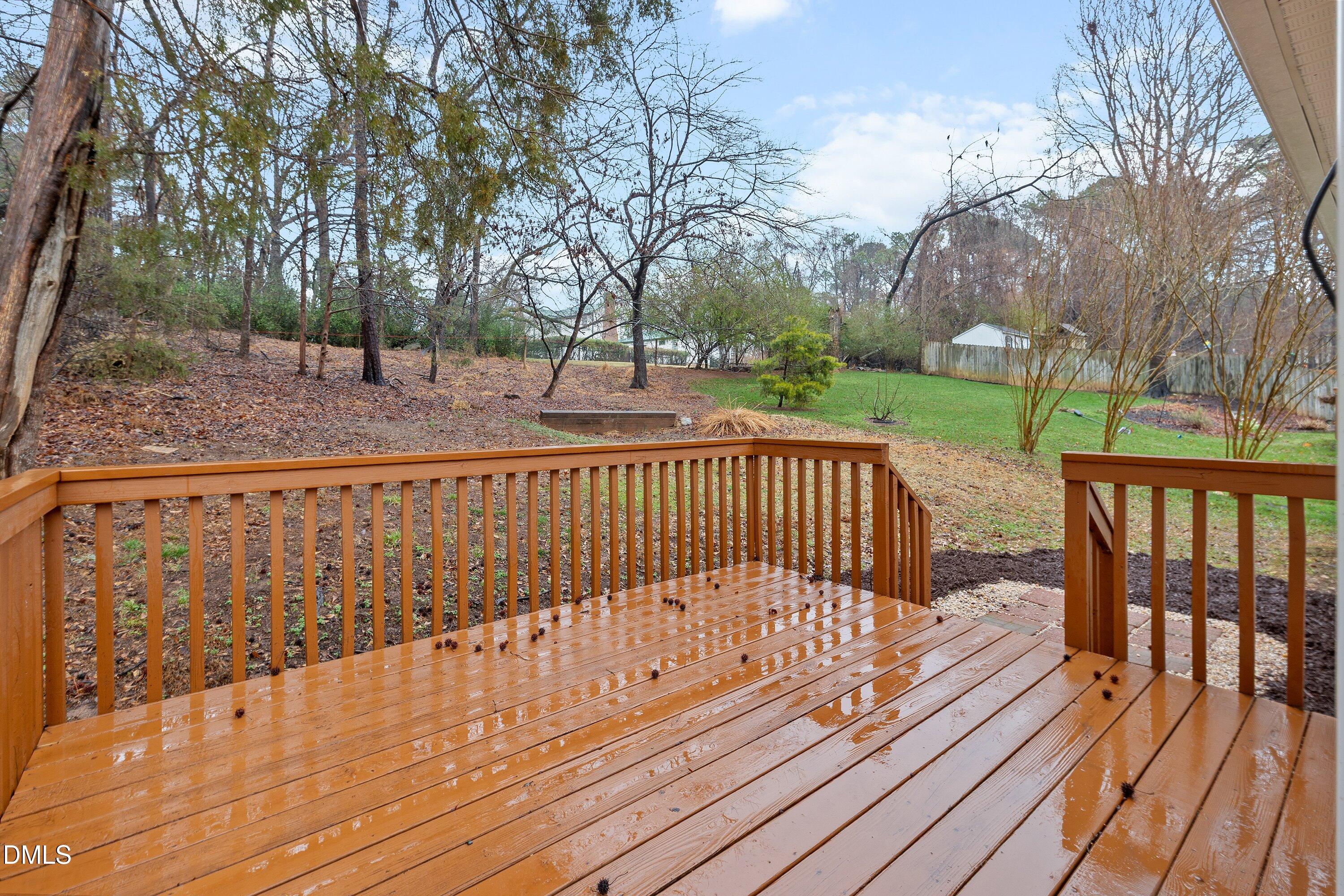140 Melksham Road Wake Forest, NC 27587 - Photo 7 of 34 a view of deck with wooden floor and fence