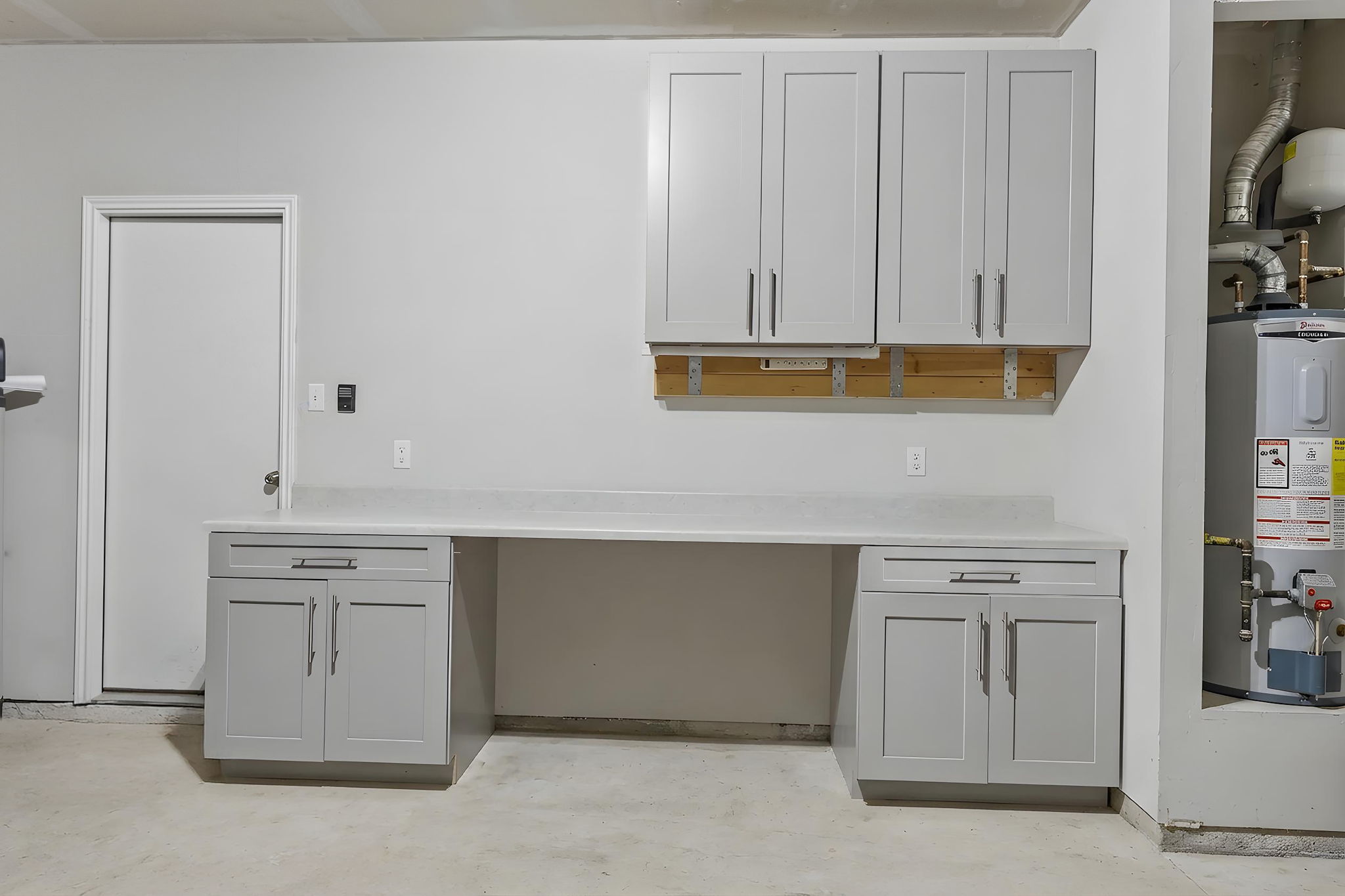 809 Whitman Avenue Georgetown, TX 78626 - Photo 28 of 35 a view of cabinets with wooden floor