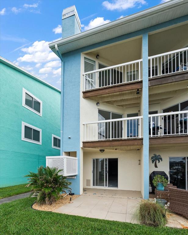 124 Marcdale Boulevard Indian Rocks Beach, FL 33785 - Photo 32 of 55 a view of a house with a yard and plants