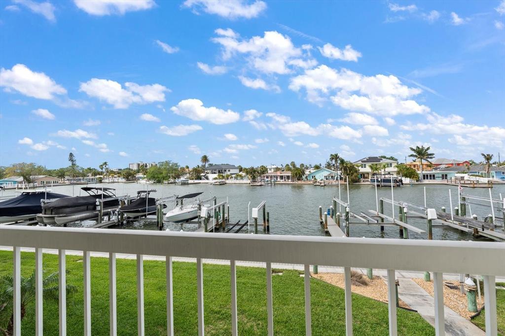 124 Marcdale Boulevard Indian Rocks Beach, FL 33785 - Photo 39 of 55 a view of a lake from a balcony