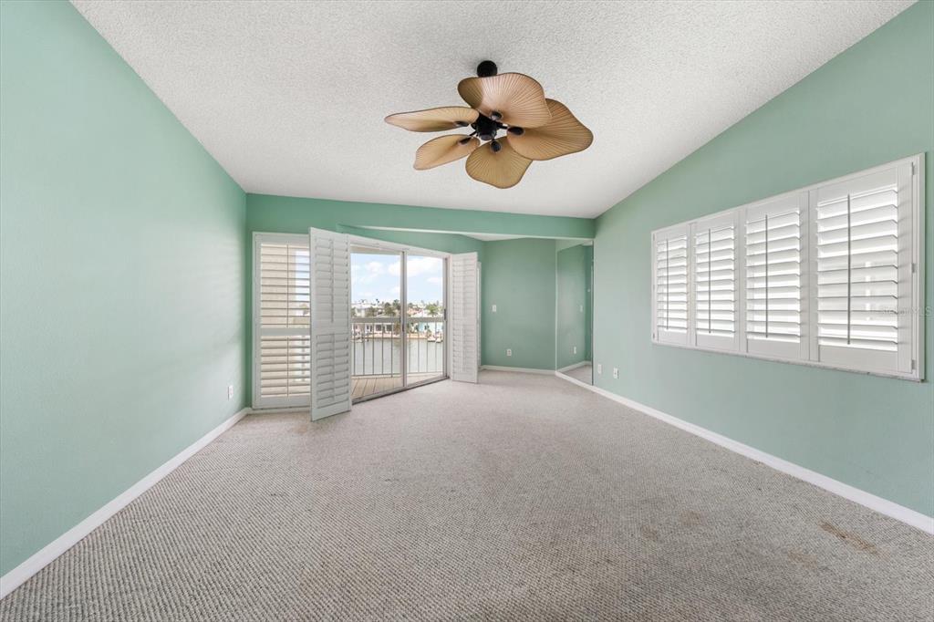 124 Marcdale Boulevard Indian Rocks Beach, FL 33785 - Photo 45 of 55 a view of an empty room with a window