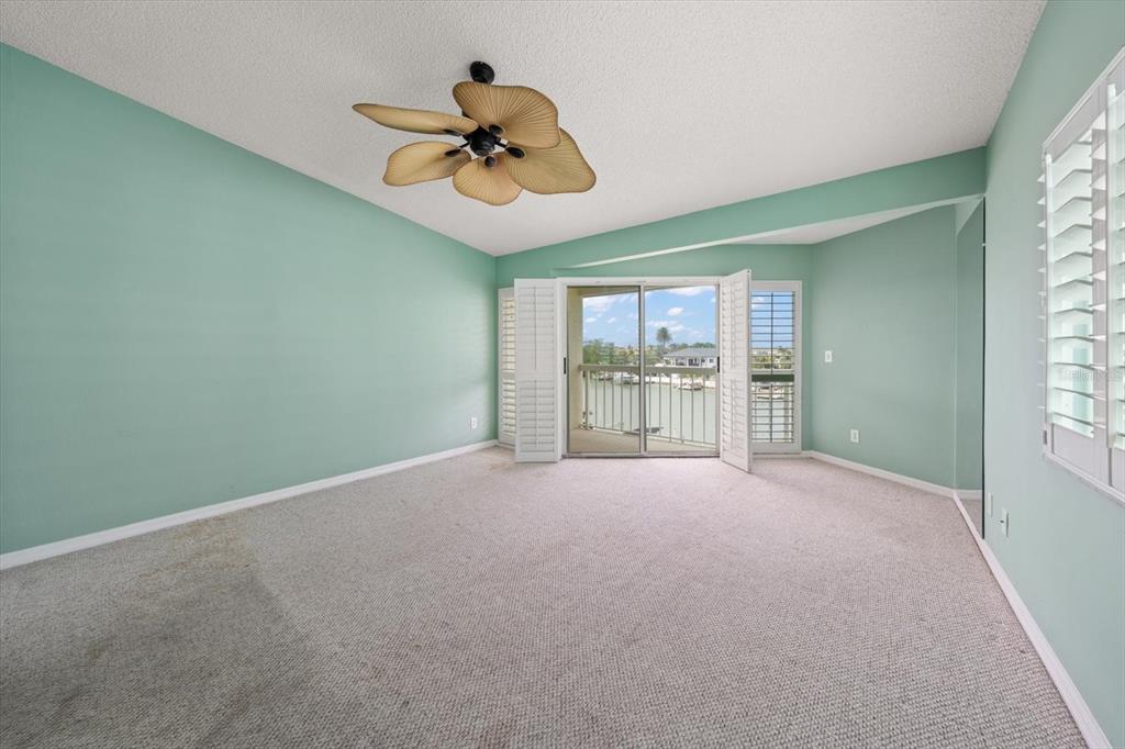 124 Marcdale Boulevard Indian Rocks Beach, FL 33785 - Photo 46 of 55 a view of an empty room with a window