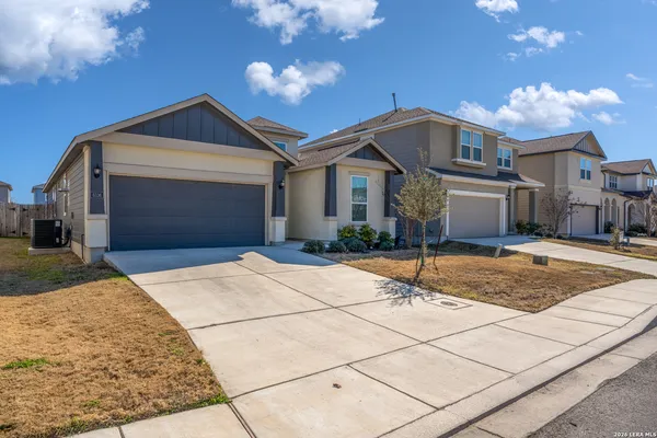 a house with trees in front of it