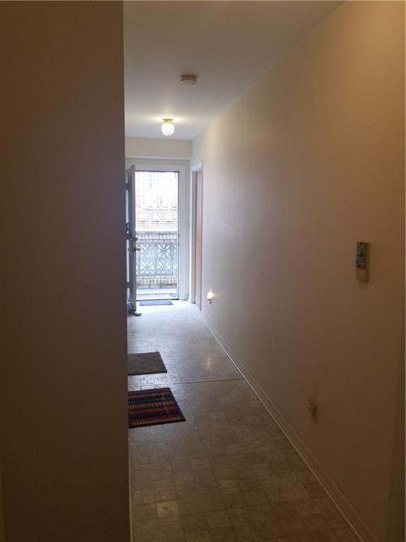 72 Brighton 1st Lane Brooklyn, NY 11235 - Photo 3 of 10 a view of hallway with windows