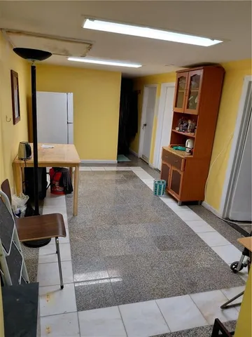 a room with furniture and a window