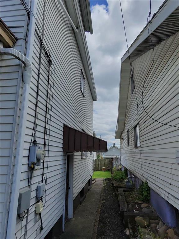 1131 13th Street McKees Rocks, PA 15136 - Photo 13 of 13 a view of a house with a yard