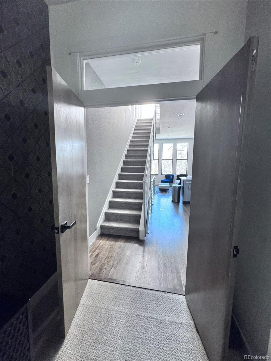 931 33rd Street Denver, CO 80205 - Photo 13 of 16 a view of entryway and hall with wooden floor
