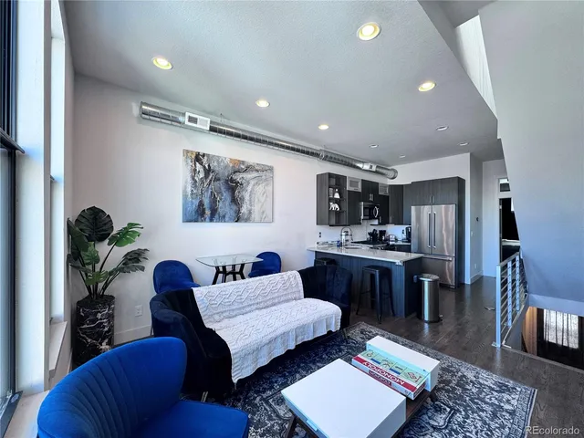 a bed room with a bed furniture and a fireplace