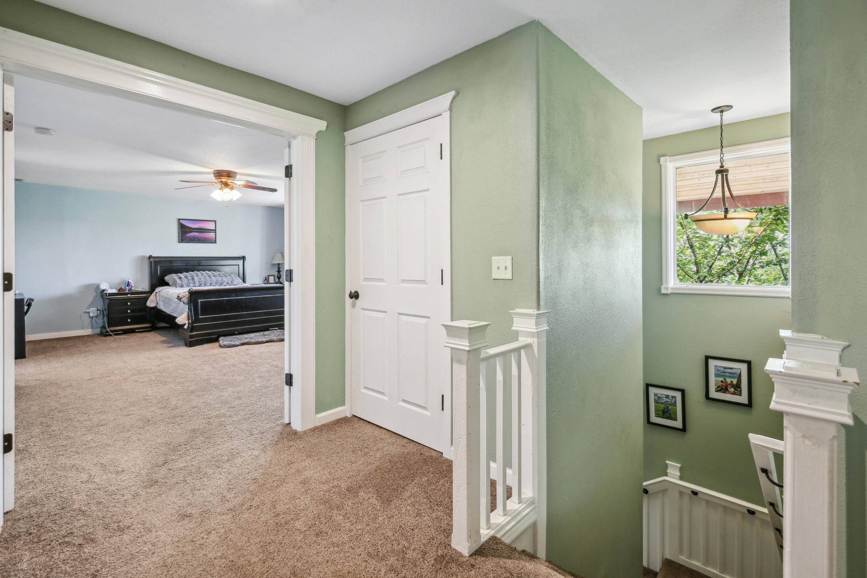 448 Wren Ridge Drive Eagle Point, OR 97524 - Photo 15 of 45 a view of hallway with livingroom and furniture