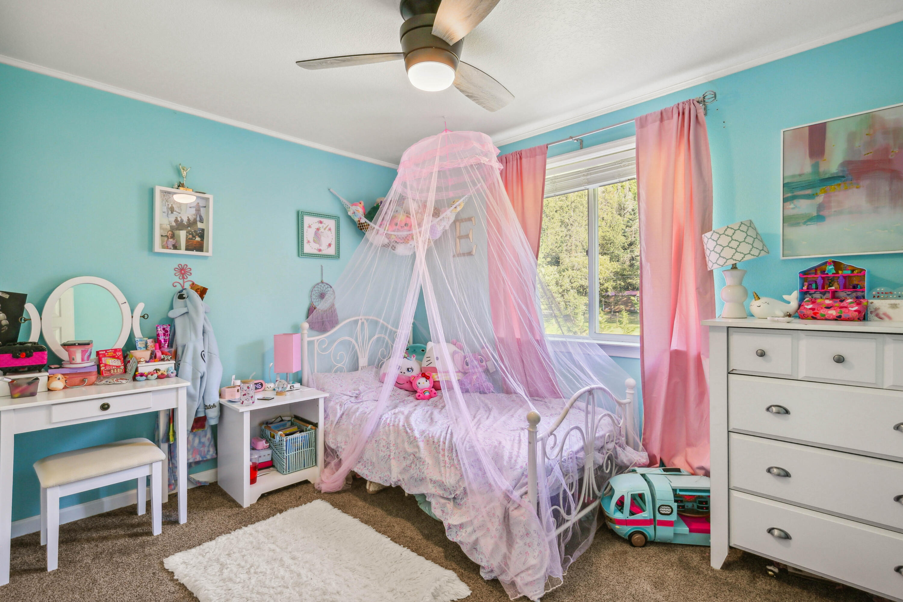 448 Wren Ridge Drive Eagle Point, OR 97524 - Photo 21 of 45 a bedroom with a bed and a window