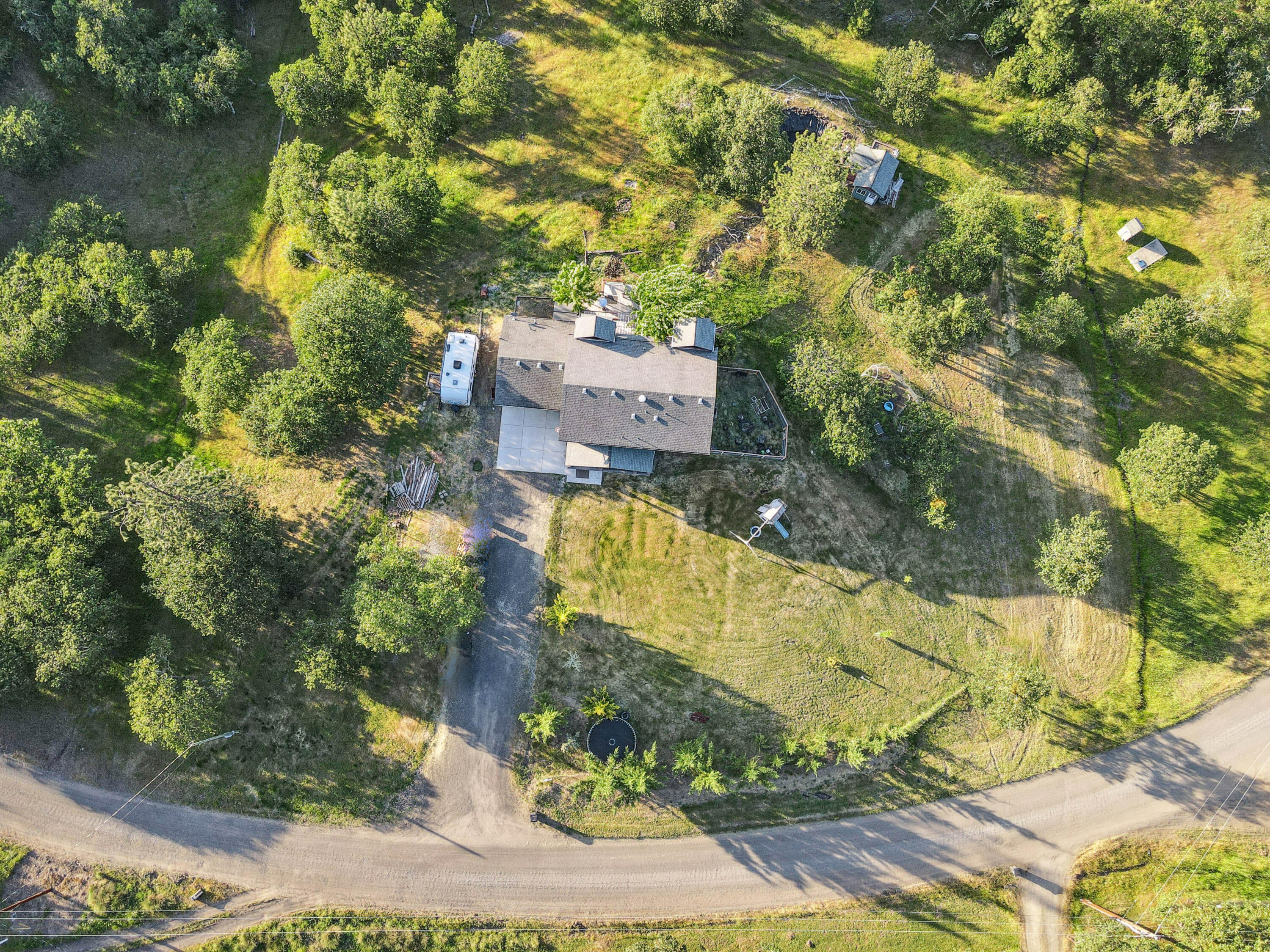 448 Wren Ridge Drive Eagle Point, OR 97524 - Photo 44 of 45 an aerial view of a house with a yard basket ball court and outdoor seating