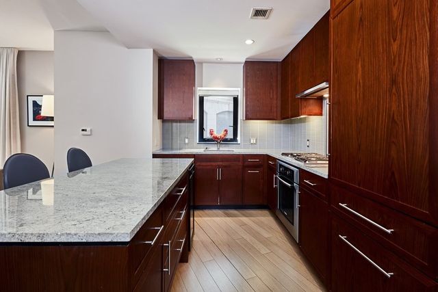 $1,915,000 | 580 Washington Street, Unit 202, Boston, MA 02111