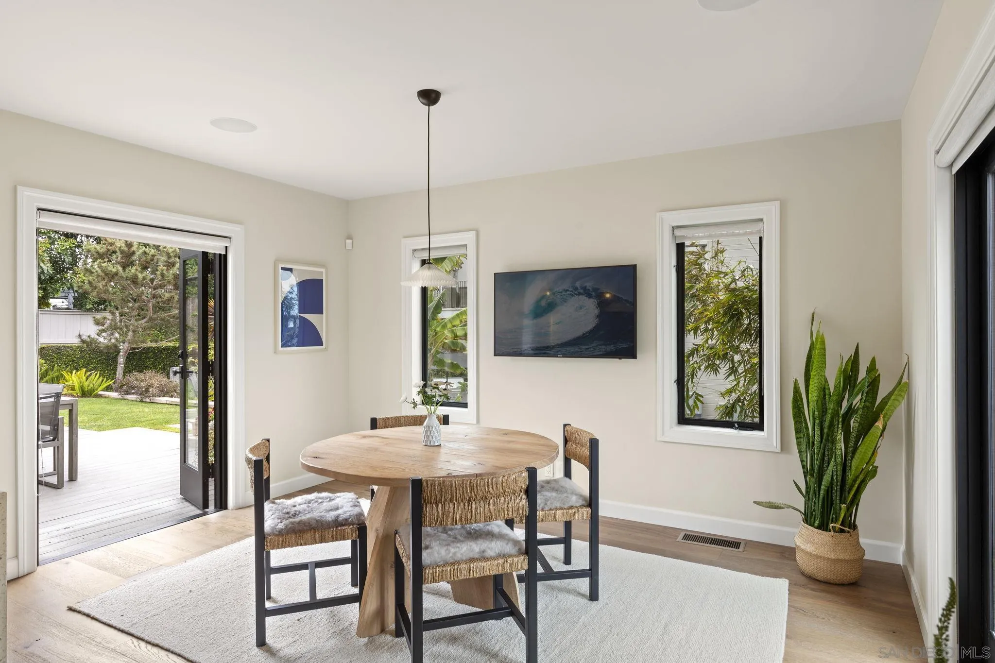 321 Fern Glen La Jolla, CA 92037 - Photo 11 of 46 a view of a dining room with furniture window and outside view