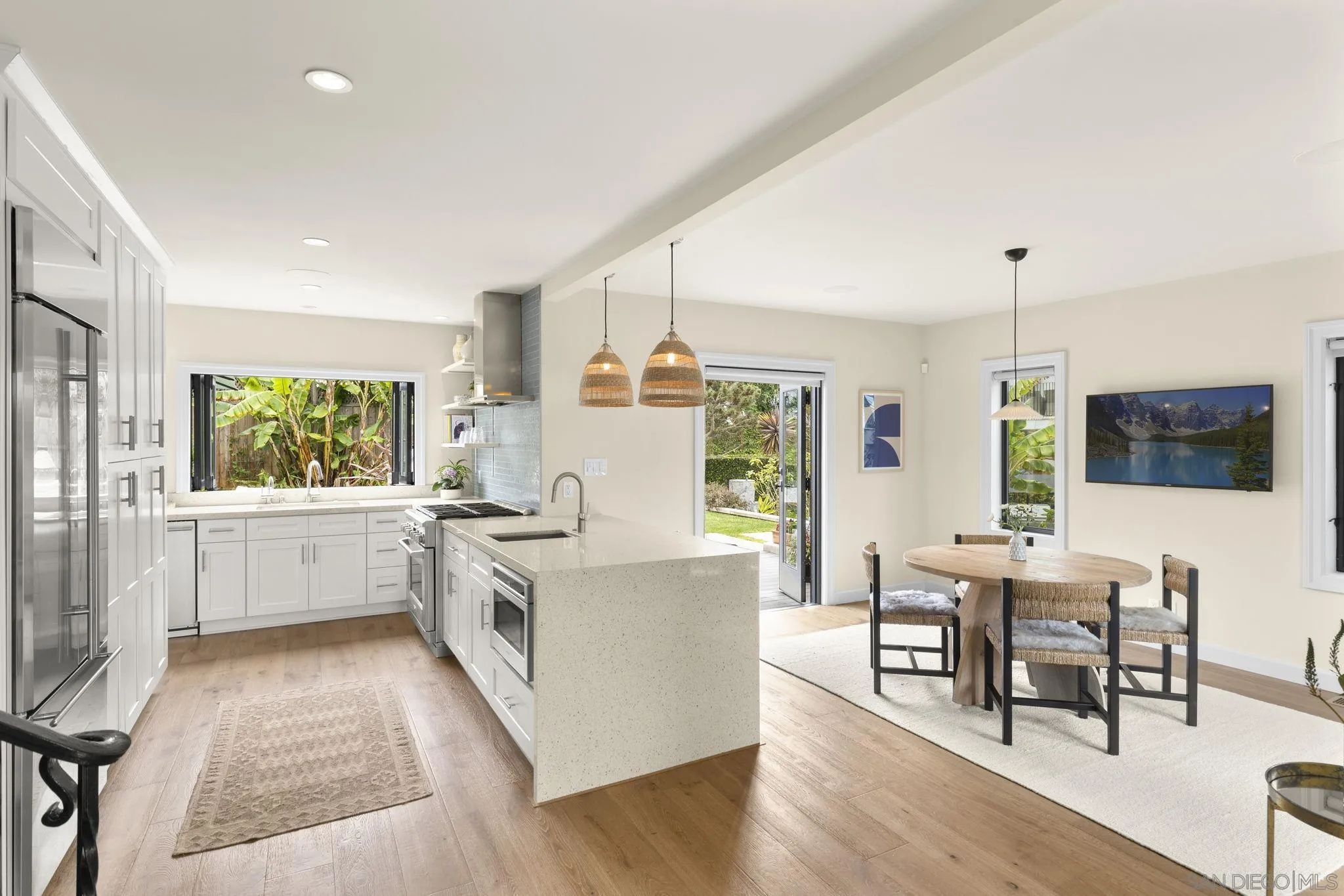 321 Fern Glen La Jolla, CA 92037 - Photo 12 of 46 a kitchen with a sink and breakfast area