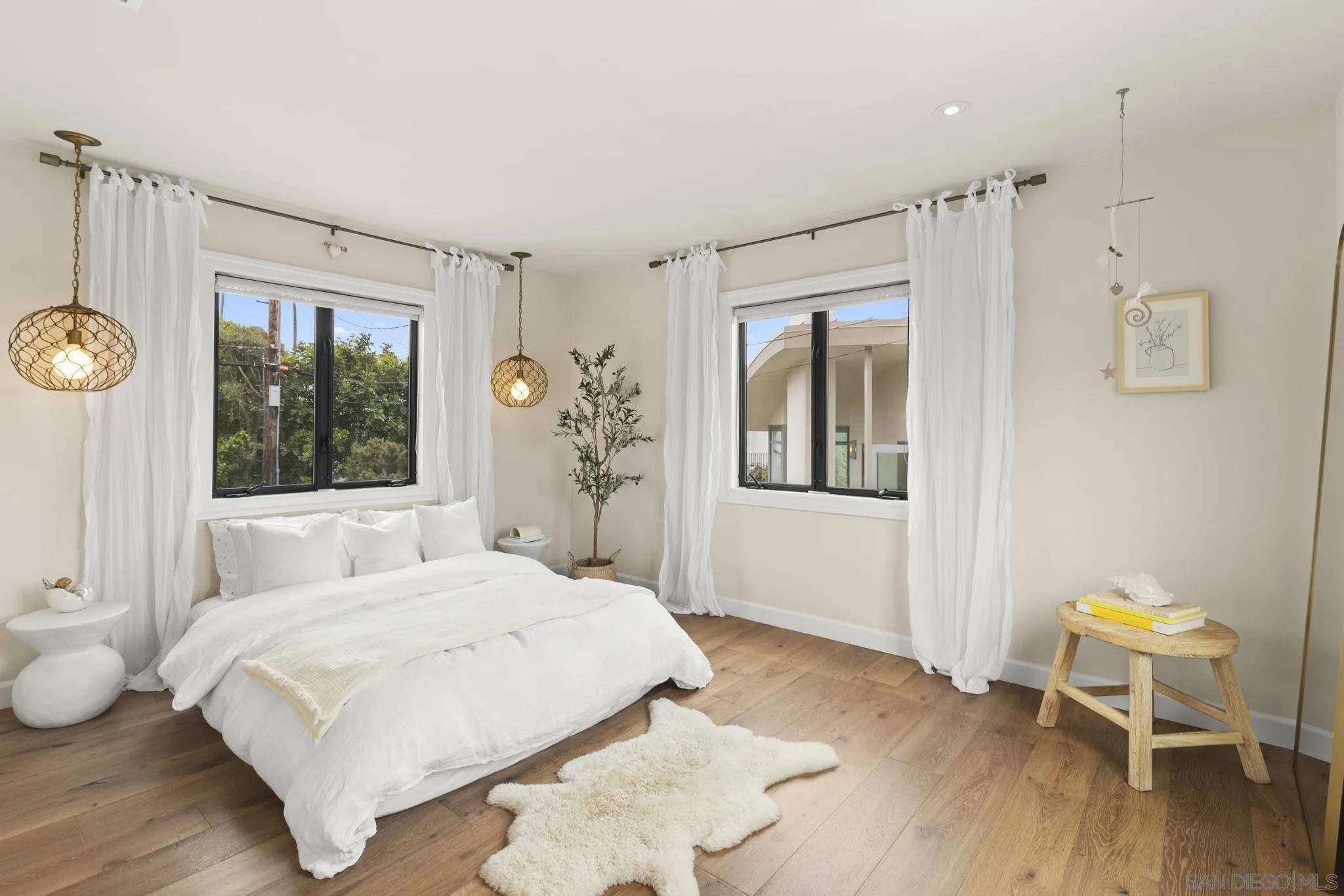 321 Fern Glen La Jolla, CA 92037 - Photo 18 of 46 a bedroom with a bed and a window