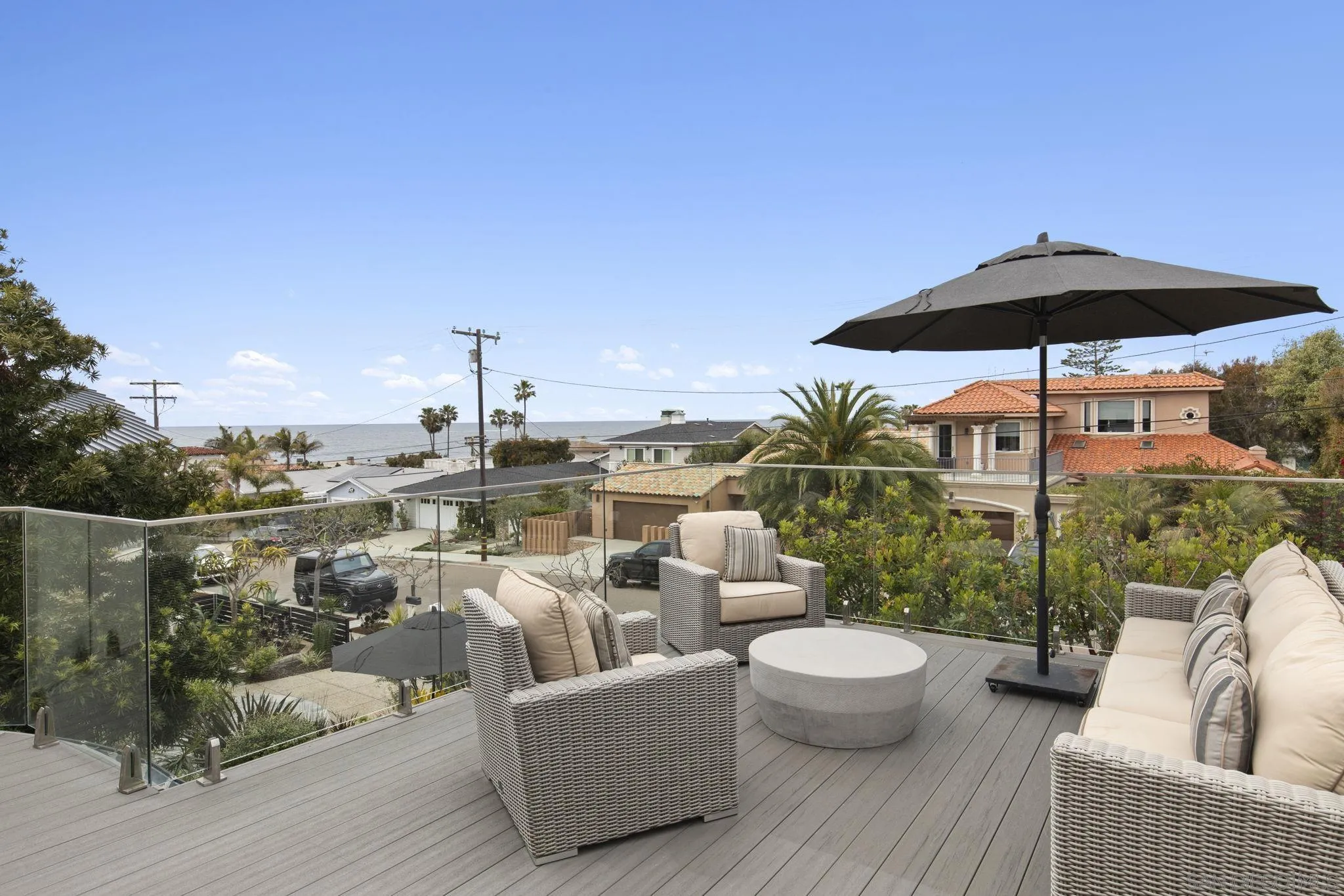 321 Fern Glen La Jolla, CA 92037 - Photo 22 of 46 a view of a terrace with couches and potted plants
