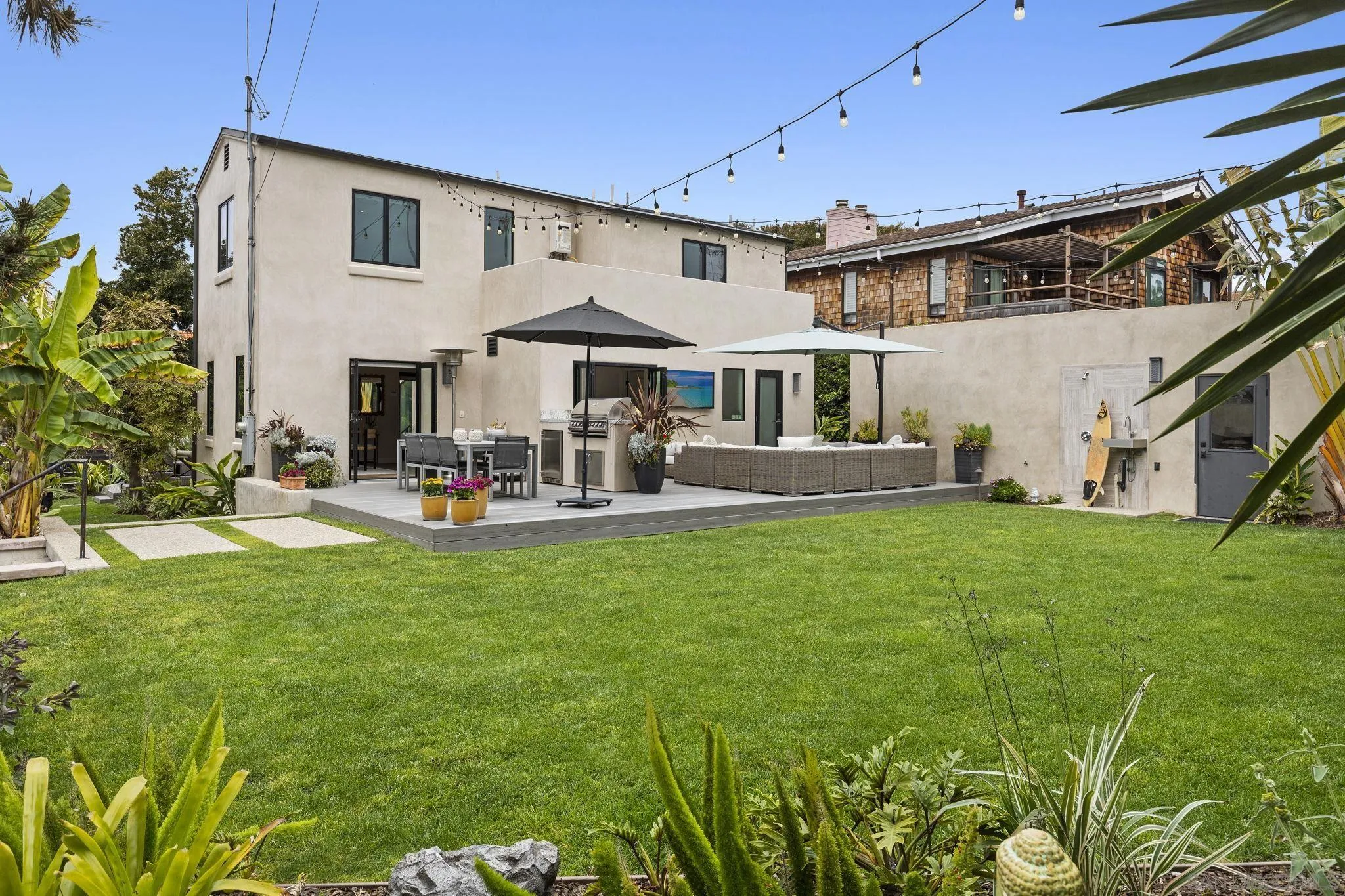 321 Fern Glen La Jolla, CA 92037 - Photo 27 of 46 a front view of a house with garden