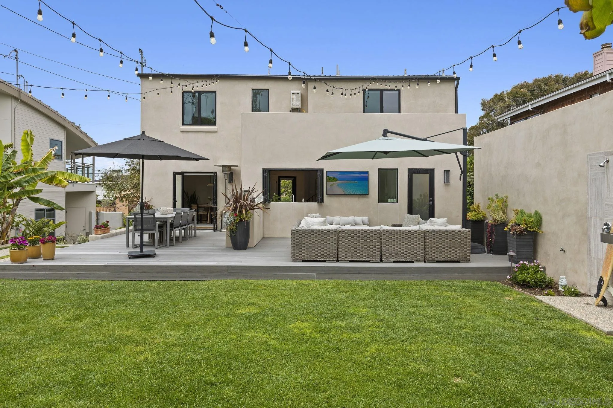 321 Fern Glen La Jolla, CA 92037 - Photo 30 of 46 a front view of a house with a big yard