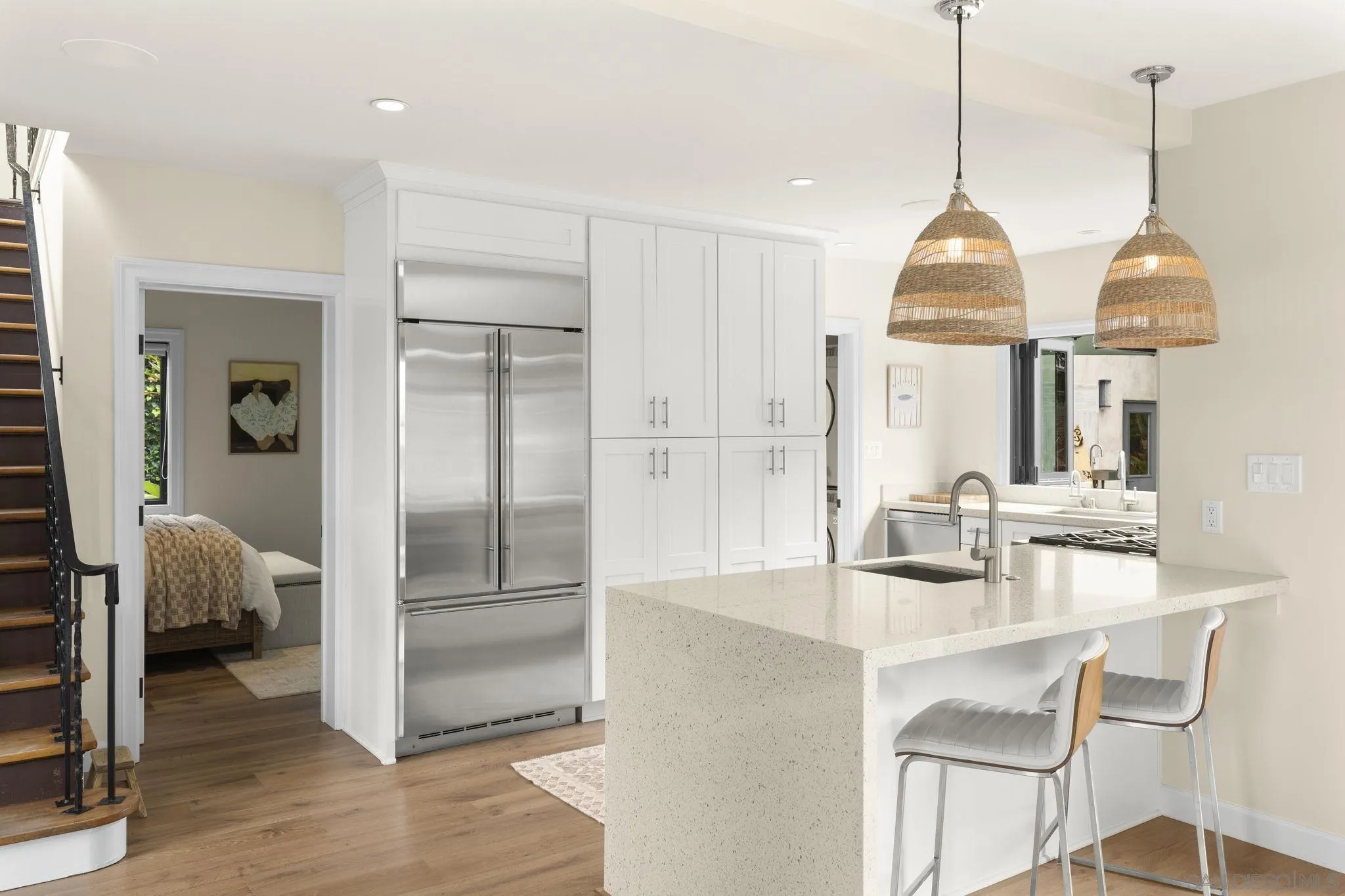 321 Fern Glen La Jolla, CA 92037 - Photo 8 of 46 a dining room with granite countertop furniture and a chandelier