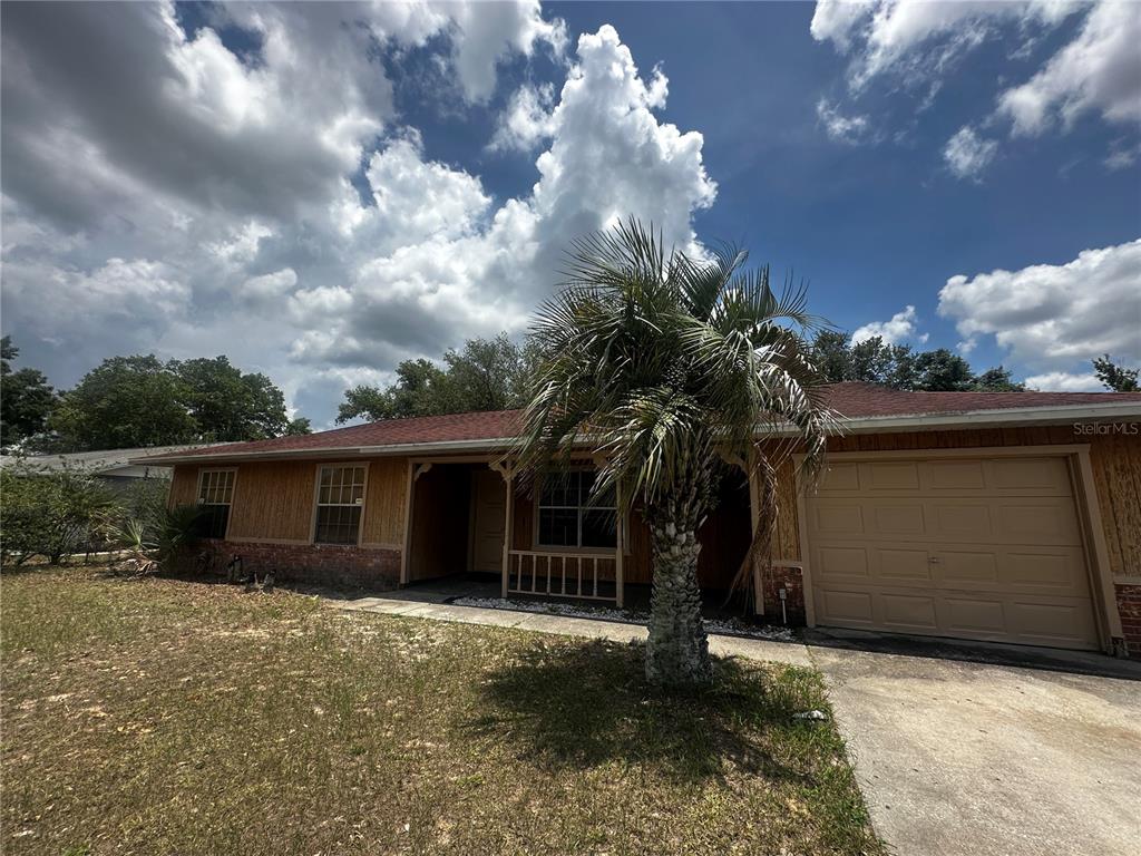 66 Silver Lane Ocala, FL 34472 - Photo 1 of 10 a view of a house with a yard