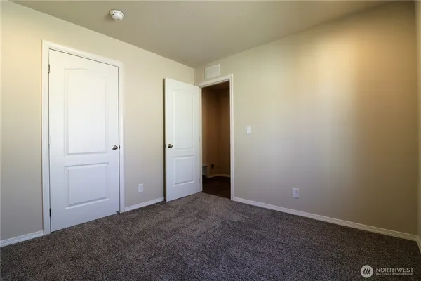 an empty room with an entryway