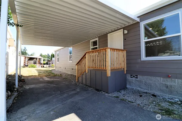 a view of backyard and porch